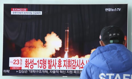 A man in South Korea watches a TV report about the latest missile launch by Pyongyang.