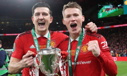 Harry Maguire (left) and Scott McTominay with the Carabao Cup in February.