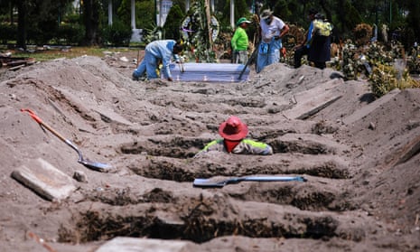 Cemetery workers bury a presumed victim of Covid-19 in Mexico City.