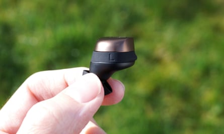 A Sennheiser Momentum True Wireless 4 earbud with smallest silicone wing fitted.