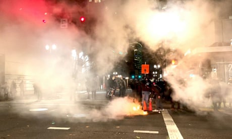 A fire burns on the street during protests in Portland, Oregon after Kyle Rittenhouse was found not guilty over the shooting deaths of two people at an anti-racism protest in Kenosha, Wisconsin, last year.