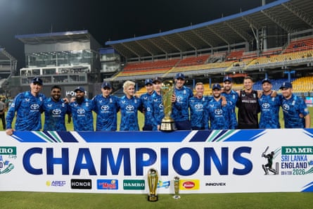 England’s squad pose with the trophy after becoming the first away team to win an ODI series in Sri Lanka for five years