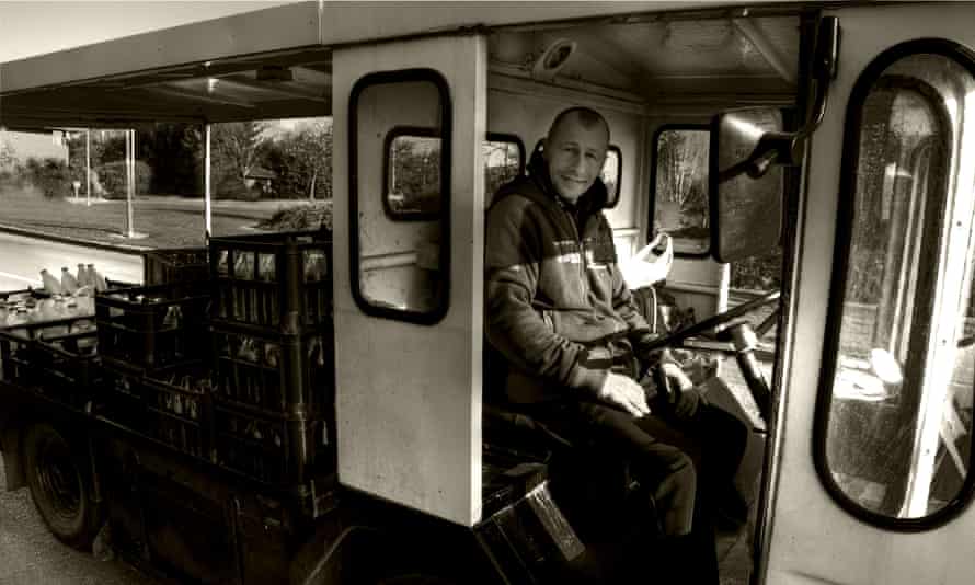 A traditional British electric milk float.