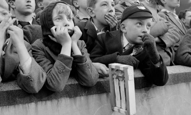Young fans at Queen’s Park Rangers with rattle at the ready in 1949. If they only knew what was coming.