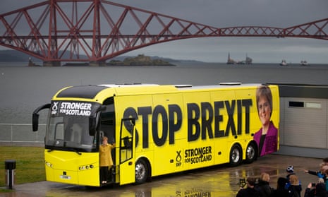 Nicola Sturgeon with the SNP campaign bus in front of the Forth Bridge.