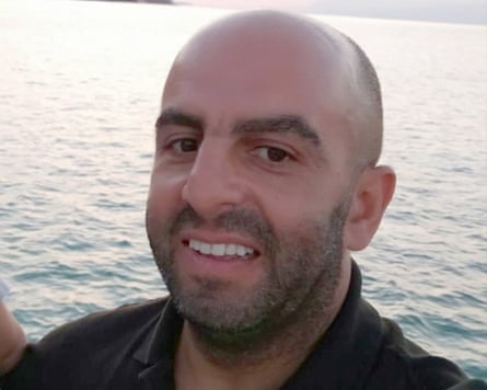 Family photo of Samir by the sea