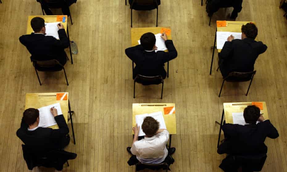 Pupils sitting an exam. The Dispatches programme describes how the use of exam results, league tables and performance indicators have increased the pressure on students, teachers and institutions to succeed.