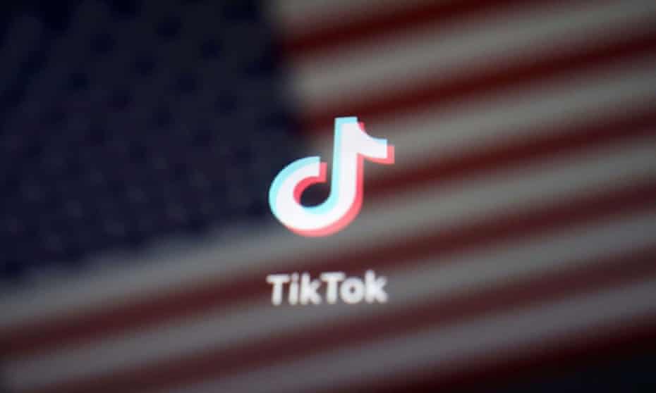 Illustration picture of US flag with TikTok logo