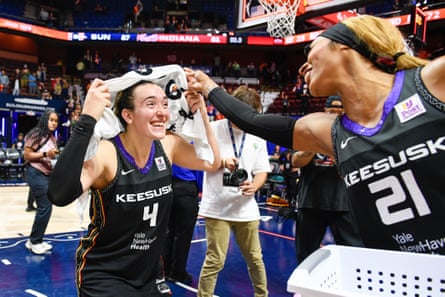 Two Connecticut Sun players in jerseys that say âÂÂKeesuskâÂÂ, which means âÂÂsunâ in the Mohegan language.