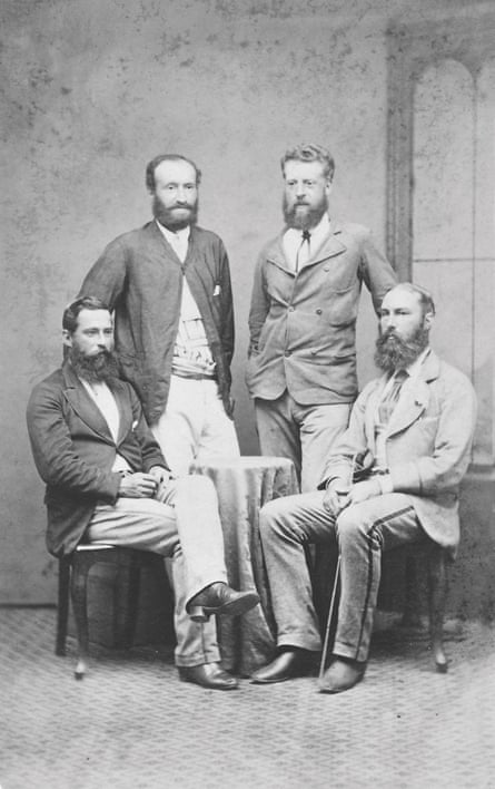 four white mean with beards in the formal dress of the 1800s