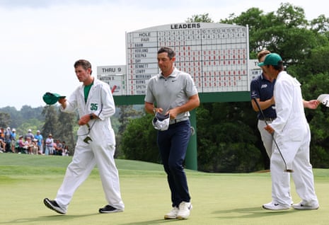 Rory McIlroy walks off the 18th and will surely miss the cut after posting 77 in his second round.