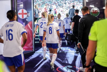 Georgia Stanway of England and other players leave the tunnel.
