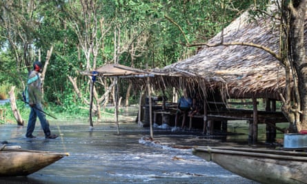 A fisher visits family on sinking shores.