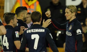 Fernando Torres is congratulated by his team-mates after giving Atlético Madrid the lead.
