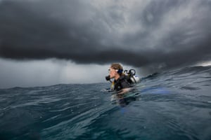 South Ari Atolls, Maldives. The photo shows my partner and dive buddy, Emma, surfacing after the last dive of the day to 1.5 metre swells and dark monsoon clouds