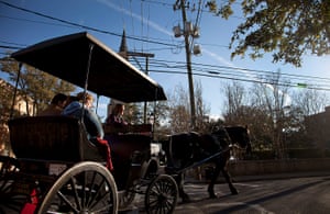 No 2 on the list: tourists take a horse drawn carriage ride through the historic area in Charleston, South Carolina.