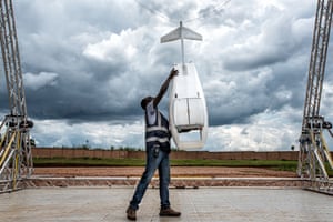 A drone returns to Kayonza after delivering blood to Kibungo hospital in Rwanda, and flight operator Egide K Rutaganirae begins preparations for its next trip. The drones can carry up to 1.5kg of cargo at a time
