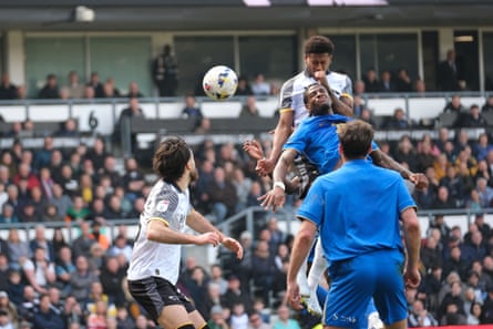 Derby’s Rhian Brewster heads a extremity against Birmingham.