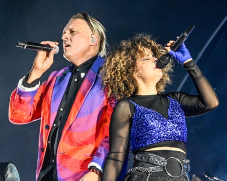Butler and Chassagne performing in California in 2022.