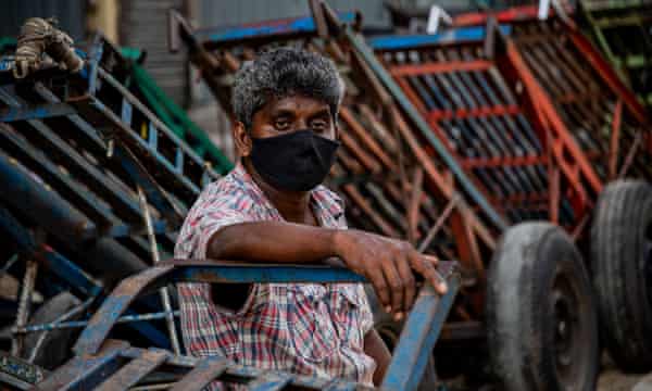 A man working outdoors in Colombo