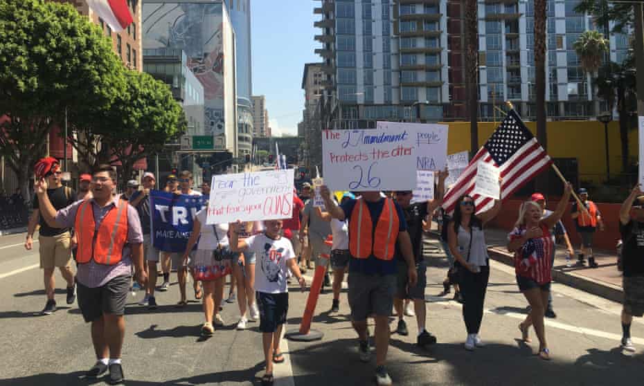 About 50 gun rights advocates marched in Los Angeles on Saturday as part of the March 4 Our Rights, a conservative counterpoint to the March for Our Lives.