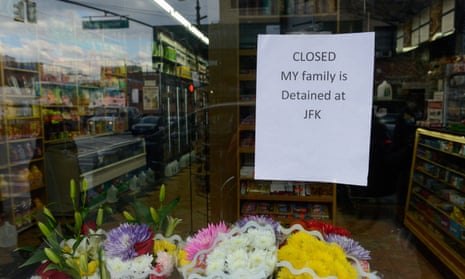 A Yemeni bodega explains why it is closed before a protest against Donald Trump’s travel ban, in the Brooklyn borough of New York City on Thursday.