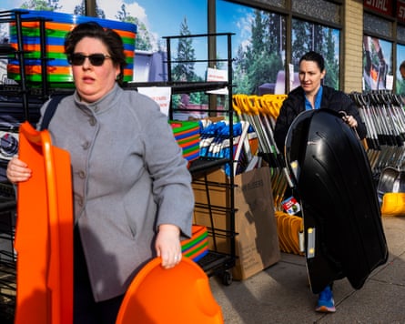 Shoppers stock up on sleds and snow shovels ahead of a winter storm in Bethesda, Maryland.