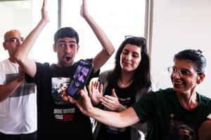 Family speaks to yet to be freed Israeli hostage Nimrod Cohen via video call on a smartphone