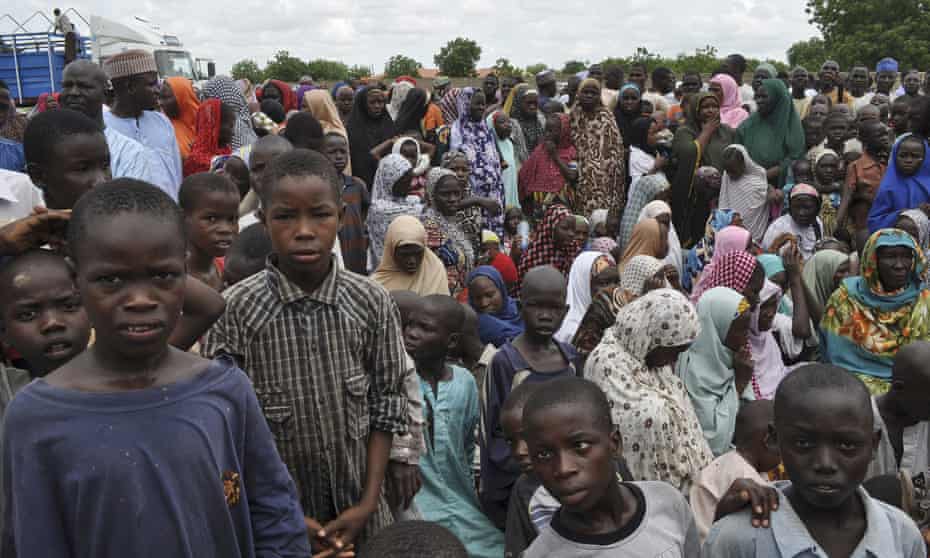 People displaced by Boko Haram take refuge at a school in the regional capital, Maiduguri. 