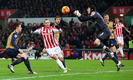 Petr Cech punches the ball clear ahead of Marko Arnautovic