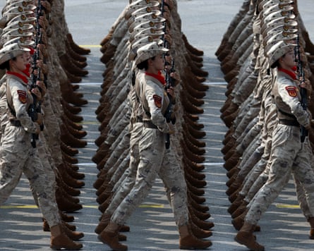 Soldiers march in unison during the military parade in Beijing