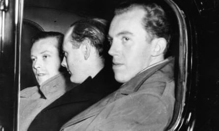 From left, Michael Pitt Rivers, Lord Montagu of Beaulieu and Peter Wildeblood leave court after being found guilty of gross indecency, London, 1954.