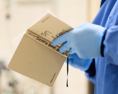 Simon Spiro, ZSL’s in-house pathologist, makes notes in his ‘Death Book’, after conducting a postmortem on Nugget