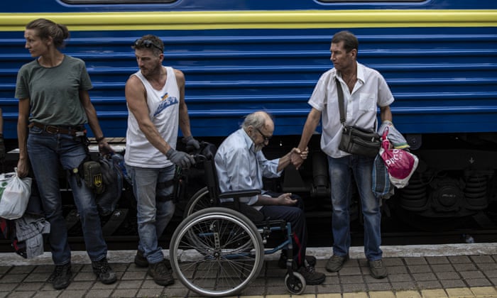 Civilians at Pokrovsk station during a mandatory evacuation from parts of Donetsk 