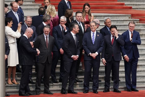US luminaries including secretary of war Pete Hegseth pose for a picture before attending the state banquet in Beijing.