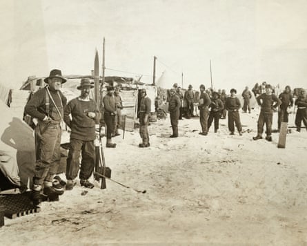 A achromatic and achromatic images shows members of Shackleton’s expedition connected nan ice