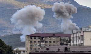 Smoke rises after shelling in Stepanakert on 9 October.