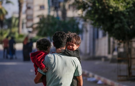A crying child as residents flee from Al Shatea refugee camp in Gaza during direct combat between the Israeli army and militants of the Ezz Al-Din Al Qassam militia, the military wing of the Hamas movement