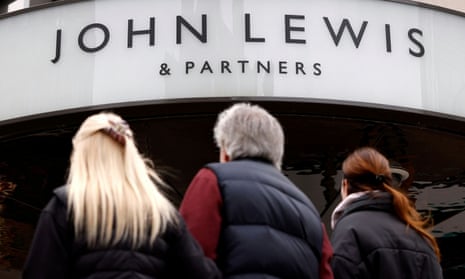 People outside a John Lewis department store on Oxford Street