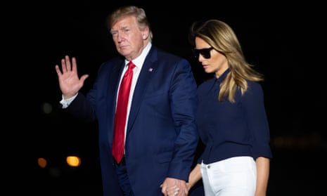 US-POLITICS-TRUMP<br>US President Donald Trump and First Lady Melania Trump walk from Marine One upon arrival on the South Lawn of the White House in Washington, DC, August 26, 2019, following their trip to the G7 Summit in France. (Photo by SAUL LOEB / AFP)SAUL LOEB/AFP/Getty Images