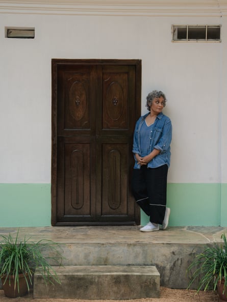 Arundhati Roy standing outside a friend’s house in Kerala