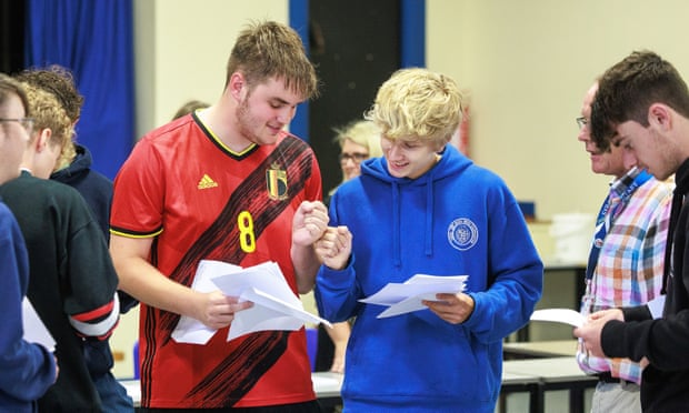 Osian McGuinness celebrates with fellow students.