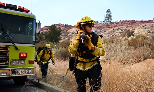Firefighters battle the Fairview fire in Hemet, in southern California on Tuesday.