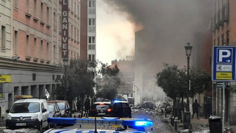 Madrid explosion: buildings destroyed and casualties reported in blast – video