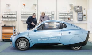 Workers inspecting the Rasa hydrogen-powered car at Riversimple, LLandrindod Wells, Wales.