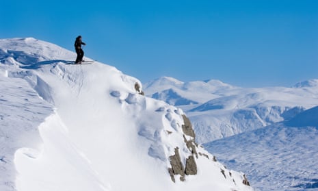 A skier at the top of Glencoe ski resort.