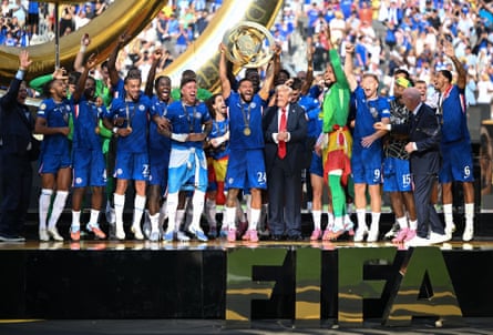 a man holding a trophy