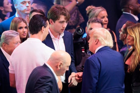 Former footballer Zlatan Ibrahimovic and Barron Trump speak with Donald Trump on Sunday night at the White House.