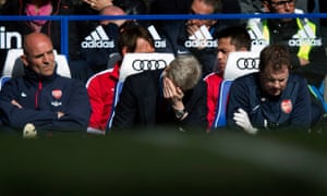 Arsene Wenger looks dejected.