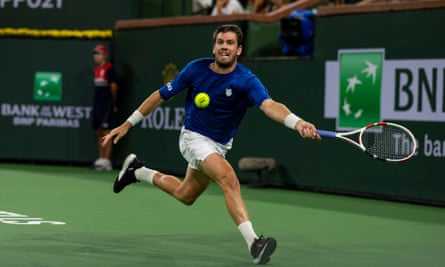 Cameron Norrie hits a forehand against Nikoloz Basilashvili of Georgia in the final.